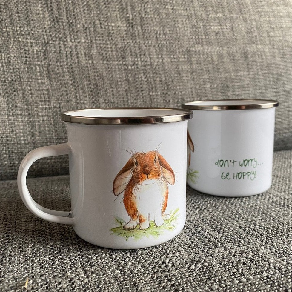  8cm tall enamel mug with metal rim > 7.9 diameter across the printed bottom > Handle measures approx. 3.3cm from side Front and back